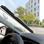 Protection solaire pour pare-brise enrouleur